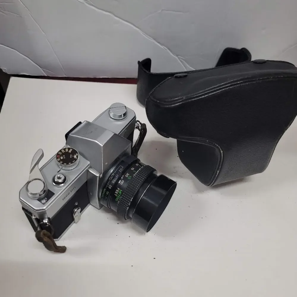 Vtg. MAMIYA Sekor 1000 DTL 35 MM camera, case, strap, Vivitar 55 MM lens